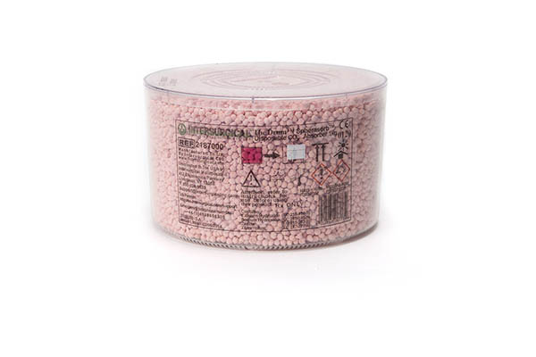 Drum, vienkartinė Spherasorb™ absorbento kasetė, spalva keičiasi iš rožinės į baltą.